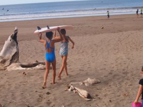 Children head off to surf from San Juan del Sur Day School, San Juan del Sur, Nicaragua – Best Places In The World To Retire – International Living